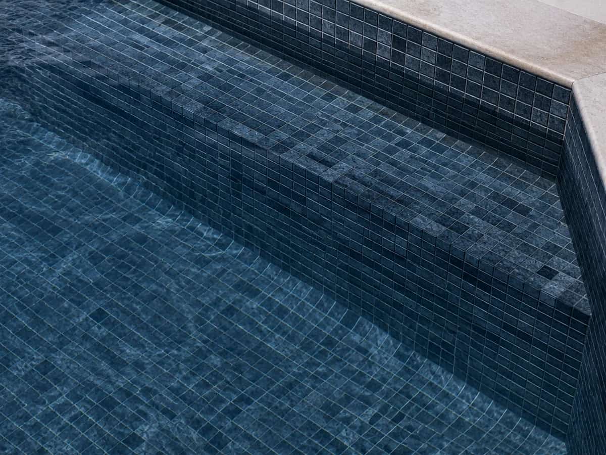 Dark tile pool finish